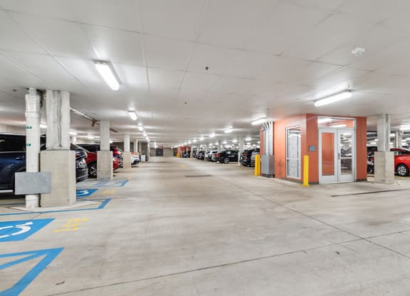 the inside of a parking garage filled with cars at Bakery Living, Pittsburgh, PAat Bakery Living, Pittsburgh, PA