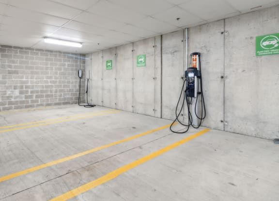 a gas station in a parking garage with a gas pump at Bakery Living, Pittsburgh, PA