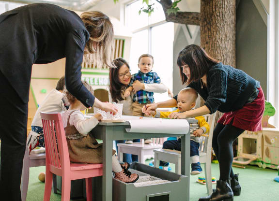 Women and children playing at Bakery Living in Pittsburgh, PA 15206