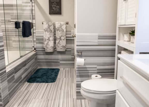 a bathroom with a toilet and a shower at The Washington at Chatham, Pittsburgh, PA