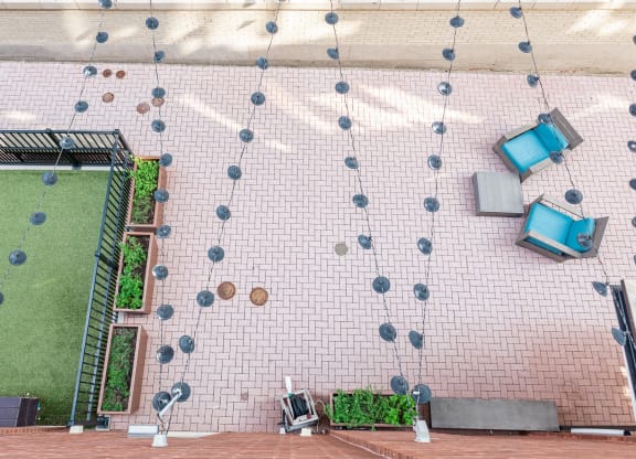 an aerial view of a patio with a lawn and television set at Walnut on Highland, Pittsburgh, PA