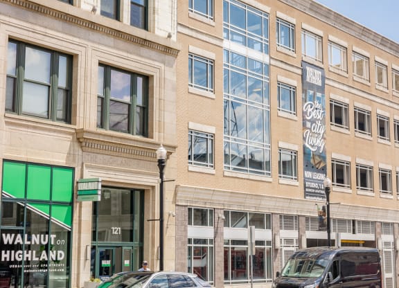 a city building with cars parked in front of it at Walnut on Highland, Pittsburgh, PA