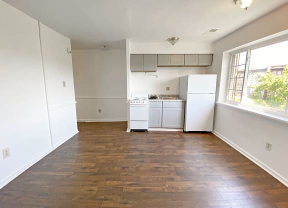 Kitchen with Hardwood Flooring at University Commons, Pennsylvania