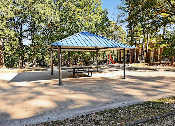 A Gazebo With a Blue Roof at Fair Oaks Apartments, Little Rock