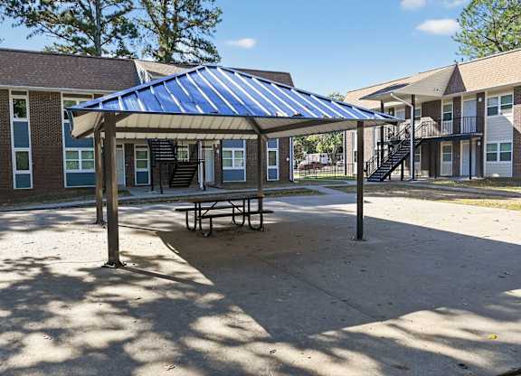 A Blue Shade Provided Over a Picnic Table at Fair Oaks Apartments, Little Rock, AR