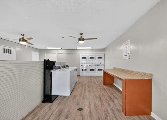 Laundry Room With Celling Fan at Fair Oaks Apartments, Little Rock, 72204