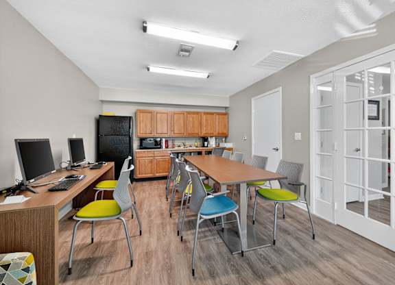 A Room With a Desk and Chairs at Fair Oaks Apartments, Arkansas, 72204