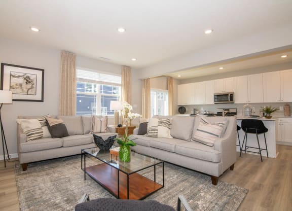 a living room with two couches and a coffee table at Jackson Run Townhomes, Indiana