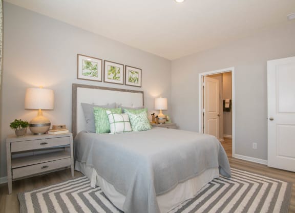 a bedroom with a bed and a rug at Jackson Run Townhomes, Indiana, 46075