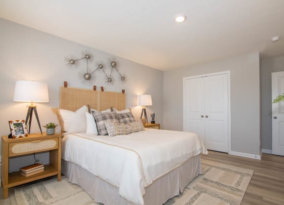 a bedroom with a bed and a closet at Jackson Run Townhomes, Whitestown, 46075
