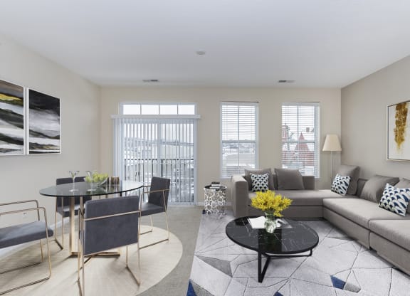 Family room with sofa at Monmouth Row Apartments, Newport, KY