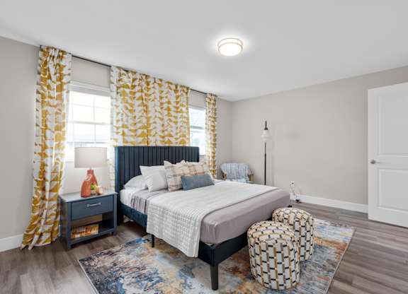 Bedroom with a window at The Rand Apartments, Columbus, OH, 43227