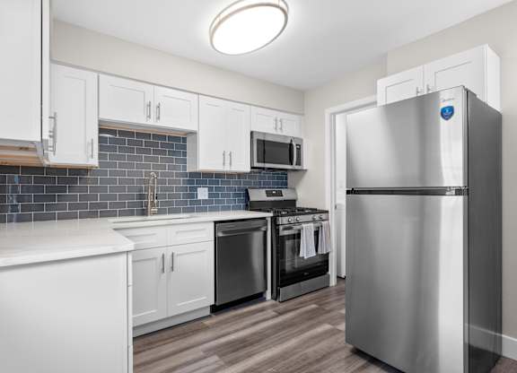 Kitchen with refrigerator at The Rand Apartments, Ohio, 43227