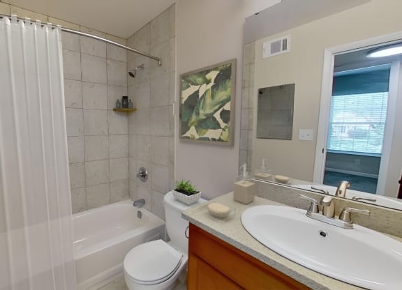 Bathroom with a sink toilet and shower at Merrick Place, Lexington, KY, 40502
