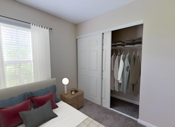 Bedroom with a large closet at Merrick Place, Lexington