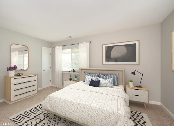 a bedroom with a large bed and a dresser with a mirror on it at 7 Pointe Apartments, Indiana