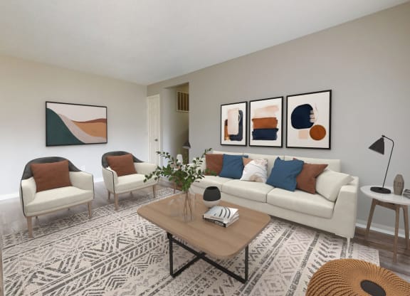 Living room with a couch and two chairs and a table at Summit at Keystone, Indianapolis, IN 46220