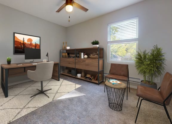 an office with a ceiling fan and a desk at Ridgeview, Fortville