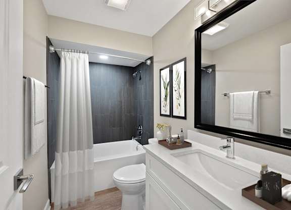 a bathroom with a sink toilet and a shower at Indian Creek Apartments*, Cincinnati, Ohio