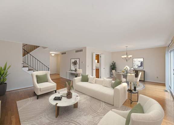 a living room with two couches and a coffee table at Indian Creek Apartments*, Cincinnati, OH