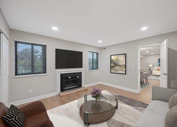 a living room with a couch and a coffee table at Indian Creek Apartments, Cincinnati, 45236