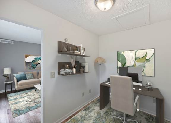 A room with a desk and a chair.