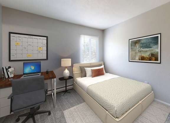 A bedroom with a bed, desk, and chair.