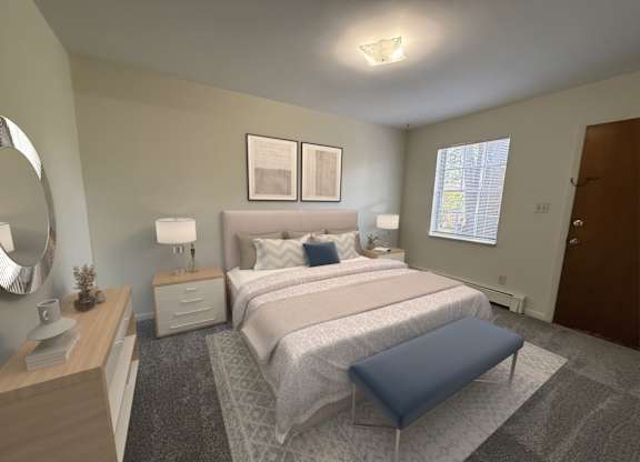 A bedroom with a large bed and a blue ottoman.