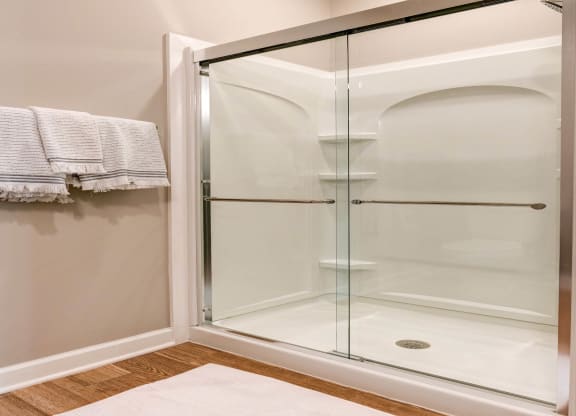 a shower with a glass door in a bathroom at Adelphi Quarter, Columbus, 43203