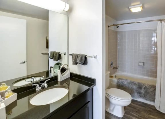 a bathroom with a sink and a toilet and a shower at The Lofts at Shillito Place, Ohio, 45202