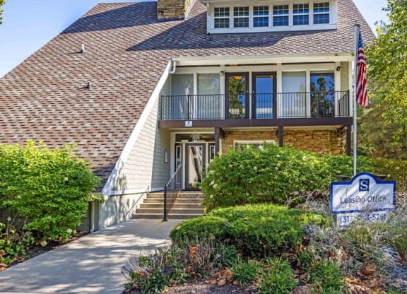 House with a flag and a sign in front of it at Summit at Keystone, Indianapolis, IN