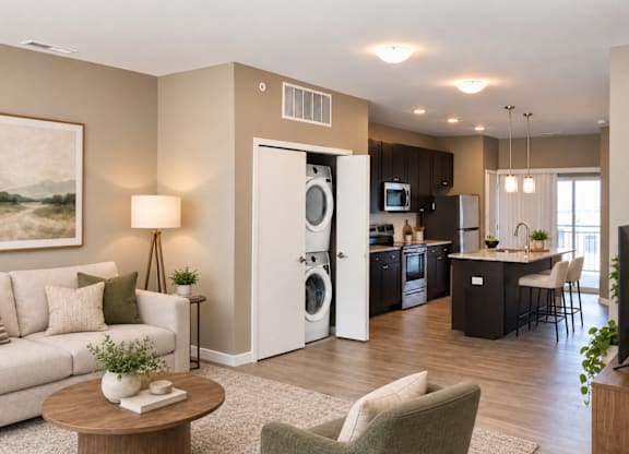 A modern kitchen with a refrigerator built into the cabinetry.