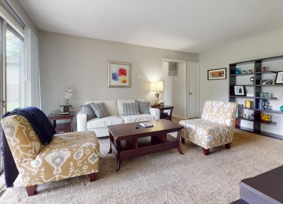 Living room with a couch chairs and a coffee table at Summit at Keystone, Indianapolis, IN 46220