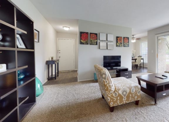 Living room with a couch and a table at Summit at Keystone, Indiana