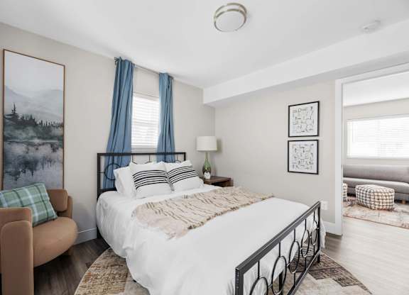 Bedroom with a painting on the wall at The Rand Apartments, Columbus, 43227
