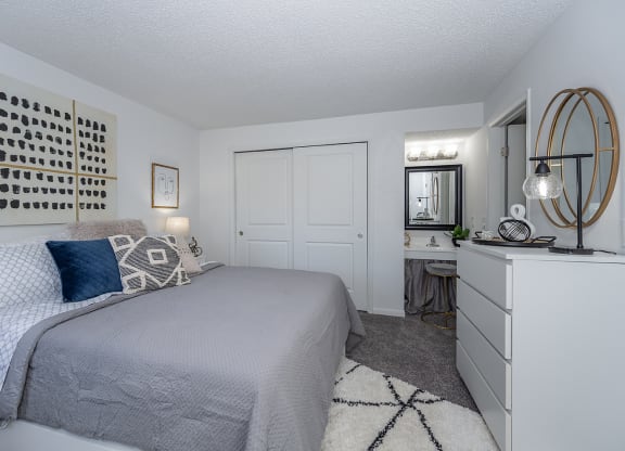 Bedroom with new gray carpet at Mallard Landing Apartments , Marion