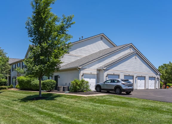 a white house with a car parked outside at Bishops Gate, Ohio, 45249