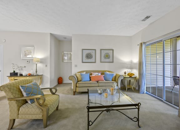 Living room with sofa and center table at Bishops Gate, Ohio