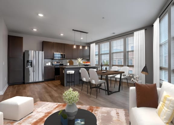 a living room and kitchen with a table and chairs at Adelphi Quarter, Columbus, Ohio