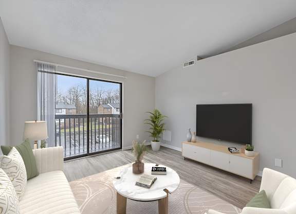 A living room with a white couch, a coffee table, a flat screen TV, and a sliding glass door at The Reserve at Grand Valley Apartments, Milford, OH, 45150