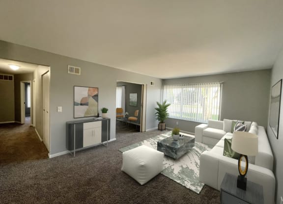 a living room with gray walls and brown carpet
