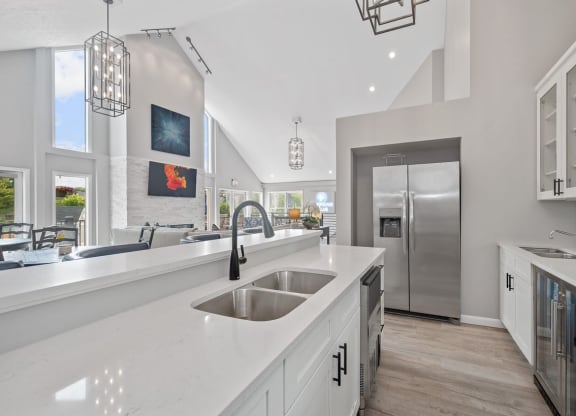 Kitchen with white countertops and stainless steel appliances at Normandy Club, Ohio, 45459