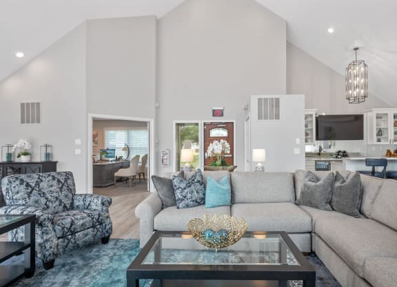 Living room filled with furniture and a large window at Normandy Club, Centerville, 45459