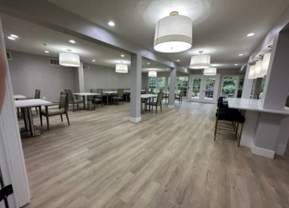 a large room with tables and chairs