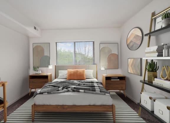 a bedroom with a bed and a window in a 555 waverly unit at The Woodridge Collection, Fairfield, OH 45014