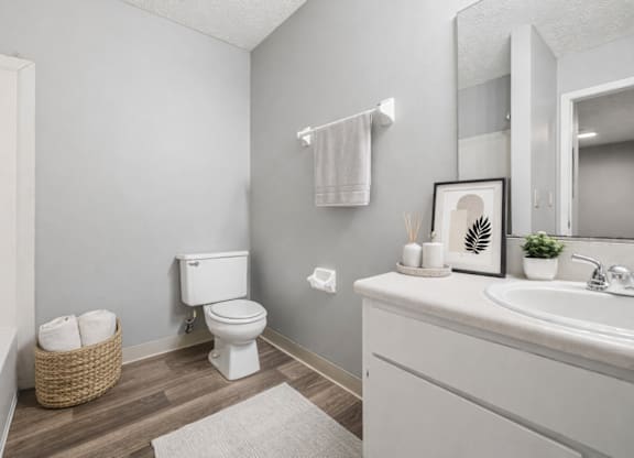 white toilet sits in a bathroom at Timbercreek Apts, Ohio, 43207