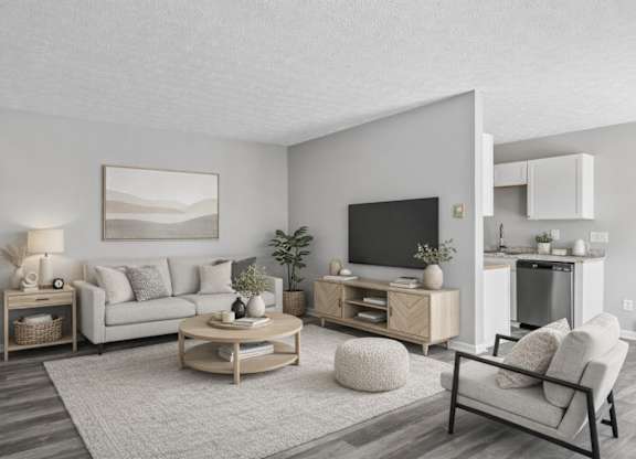 coffee table, and a television in living room at Timbercreek Apts, Columbus