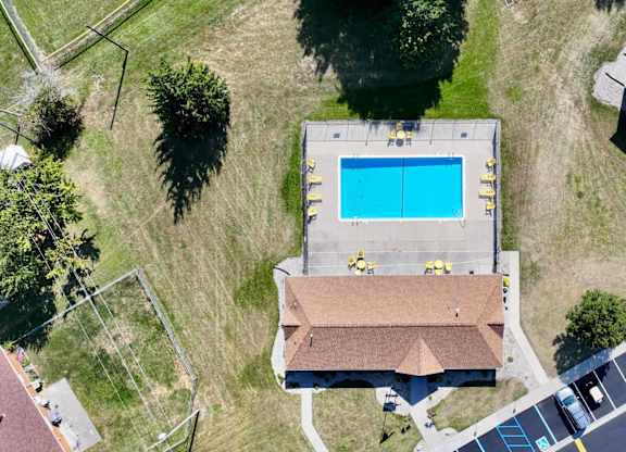 A house with a pool in the backyard.