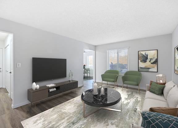 A living room with a black coffee table and a flat screen TV.