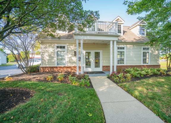 a white house with a sidewalk in front of it at Slate Ridge, Reynoldsburg, OH 43068